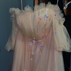 Floor length off the shoulder (it’s got sleeves for your arms) very pretty dress